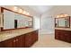 Double vanity bathroom with granite countertop and soaking tub at 2440 Jamerson Rd, Marietta, GA 30066