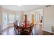 Elegant dining room with hardwood floors and large windows at 2440 Jamerson Rd, Marietta, GA 30066