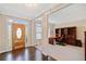 Bright entryway with hardwood floors and built-in shelving at 2440 Jamerson Rd, Marietta, GA 30066