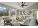 Relaxing screened porch with comfortable seating and backyard views at 2440 Jamerson Rd, Marietta, GA 30066