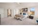 Bright and airy main bedroom with a comfortable seating area at 3103 Steinbeck Way, East Point, GA 30344