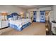 Spacious bedroom with king-size bed and stylish blue accents at 3648 Peachtree Ne Rd # 3J, Atlanta, GA 30319