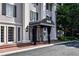 Brick building with a striped awning and steps leading to the entrance at 3648 Peachtree Ne Rd # 3J, Atlanta, GA 30319