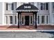 Brick building with a striped awning and steps leading to the entrance at 3648 Peachtree Ne Rd # 3J, Atlanta, GA 30319