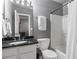 Bathroom with granite countertop and shower/tub combo at 54 Devonshire Dr, Alpharetta, GA 30022