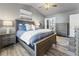 Bright bedroom featuring a comfortable bed and ensuite access at 54 Devonshire Dr, Alpharetta, GA 30022