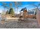 Large backyard with playset and trees at 2713 Windsor Nw Ct, Kennesaw, GA 30144