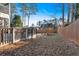 Backyard with playset and wooden fence at 2713 Windsor Nw Ct, Kennesaw, GA 30144