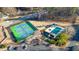 Aerial view showing community amenities including tennis courts, pool, and playground at 2713 Windsor Nw Ct, Kennesaw, GA 30144