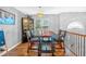 Rustic dining area with a large table and four leather chairs at 2713 Windsor Nw Ct, Kennesaw, GA 30144