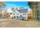 Two-story house with gray shutters, a two-car garage, and a deck at 2713 Windsor Nw Ct, Kennesaw, GA 30144