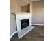 White marble fireplace with gas logs at 5464 Sierra Trl, College Park, GA 30349