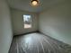 Spacious bedroom with carpet and window at 2114 Stillhaven Pl, Douglasville, GA 30135