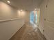 Upstairs hallway with access to bedrooms at 2114 Stillhaven Pl, Douglasville, GA 30135