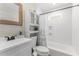 Clean bathroom with white subway tiles, a bathtub, and a vanity at 2662 Memorial Se Dr, Atlanta, GA 30317