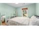 Well-lit bedroom with a comfortable bed and ample natural light at 2662 Memorial Se Dr, Atlanta, GA 30317