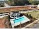 Community pool with a pool house and surrounding landscaping at 4822 Floydwood Ln, Mableton, GA 30126