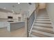 Modern staircase with metal balusters leading to the upper level at 4822 Floydwood Ln, Mableton, GA 30126