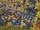 Aerial view of a residential neighborhood with houses and autumn trees at 627 Mead Se St, Atlanta, GA 30312