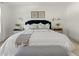 Spacious primary bedroom with plush bed and stylish decor at 627 Mead Se St, Atlanta, GA 30312