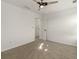 Simple bedroom with ceiling fan and access to a bathroom at 627 Mead Se St, Atlanta, GA 30312