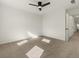 Bright bedroom with ceiling fan and carpet at 627 Mead Se St, Atlanta, GA 30312