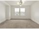 Bright bedroom with neutral decor and large windows at 627 Mead Se St, Atlanta, GA 30312