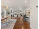 Open dining room with hardwood floors and view of the living room at 627 Mead Se St, Atlanta, GA 30312