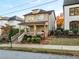 Two-story craftsman style home with front porch and landscaping at 627 Mead Se St, Atlanta, GA 30312