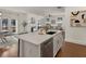 Modern kitchen with island, stainless steel appliances, and hardwood floors at 627 Mead Se St, Atlanta, GA 30312