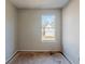 Simple bedroom with a window and wood flooring at 3727 Conley Downs Ln, Decatur, GA 30034