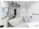 Elegant bathroom includes a freestanding soaking tub and walk-in shower at 3730 Willow Mill Dr, Lawrenceville, GA 30044