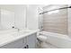 Modern bathroom with gray vanity and tile shower/tub combo at 622 Bellemeade Nw Ave # 9, Atlanta, GA 30318