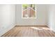 Bright bedroom with hardwood floors and large window at 622 Bellemeade Nw Ave # 9, Atlanta, GA 30318