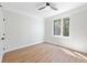 Well-lit bedroom, hardwood floors, and window at 622 Bellemeade Nw Ave # 9, Atlanta, GA 30318