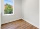 Bright bedroom with wood floors and large window at 622 Bellemeade Nw Ave # 9, Atlanta, GA 30318