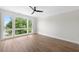 Spacious bedroom featuring wood floors and ceiling fan at 622 Bellemeade Nw Ave # 9, Atlanta, GA 30318