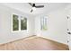 Spacious bedroom featuring hardwood floors and ceiling fan at 622 Bellemeade Nw Ave # 9, Atlanta, GA 30318