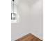 Simple dining area with hardwood floors and a modern light fixture at 622 Bellemeade Nw Ave # 9, Atlanta, GA 30318