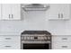 Stainless steel range and oven with white subway tile backsplash at 622 Bellemeade Nw Ave # 9, Atlanta, GA 30318