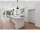 Modern kitchen with white cabinets, quartz countertops, and stainless steel appliances at 622 Bellemeade Nw Ave # 9, Atlanta, GA 30318