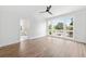 Main bedroom with hardwood floors, ensuite bath, and large window at 622 Bellemeade Nw Ave # 9, Atlanta, GA 30318