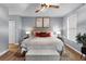 Spacious main bedroom with king-size bed and calming decor at 185 Bob White Dr, Stockbridge, GA 30281