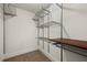 Walk-in closet with wire shelving and a wood top shelf at 5579 Julian Pl, Atlanta, GA 30342