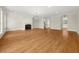 Hardwood floors and fireplace in this open living room at 5579 Julian Pl, Atlanta, GA 30342