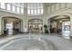 Spacious lobby with seating areas and access to the outside at 57 Forsyth St # 13D, Atlanta, GA 30303