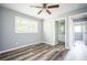 Spacious bedroom with hardwood floors and ceiling fan at 207 Okemah Se Trl, Marietta, GA 30060