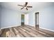 Spacious bedroom with hardwood floors and access to bathroom at 207 Okemah Se Trl, Marietta, GA 30060