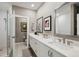 Bathroom with double vanity, quartz countertop and glass shower at 403 Pratt Se Dr # 1009, Atlanta, GA 30315