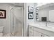 Clean bathroom with white vanity and large mirror at 403 Pratt Se Dr # 1009, Atlanta, GA 30315
